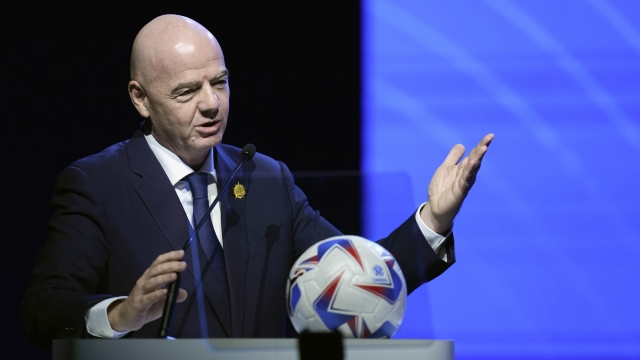 FILE - FIFA President Ganni Infantino addresses the 78th Conmebol Congress in Luque, Paraguay, Thursday, April 11, 2024. FIFA has been told to reschedule its inaugural expanded Club World Cup just over a year before the tournament is due to be hosted by America. (AP Photo/Jorge Saenz, File)