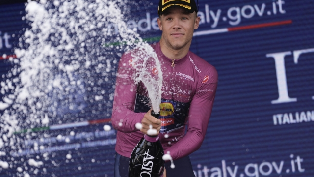 Milan Jonathan (Team Lidl - Treck) celebrates his victory on the podium with the Cyclamin Jersey  of  the stage 11 of the of the Giro d'Italia from Foiano di Val Fortore to Francavilla al Mare , 15 May 2024 Italy. (Photo by Fabio Ferrari/LaPresse)