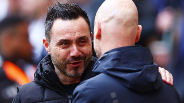 LONDON, ENGLAND - APRIL 23: Roberto De Zerbi, Manager of Brighton & Hove Albion, embraces Erik ten Hag, Manager of Manchester United, during the Emirates FA Cup Semi Final match between Brighton & Hove Albion and Manchester United at Wembley Stadium on April 23, 2023 in London, England. (Photo by Clive Rose/Getty Images)