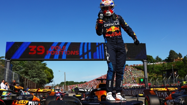 IMOLA, ITALY - MAY 18: Pole position qualifier Max Verstappen of the Netherlands and Oracle Red Bull Racing celebrates in parc ferme during qualifying ahead of the F1 Grand Prix of Emilia-Romagna at Autodromo Enzo e Dino Ferrari Circuit on May 18, 2024 in Imola, Italy. (Photo by Mark Thompson/Getty Images)