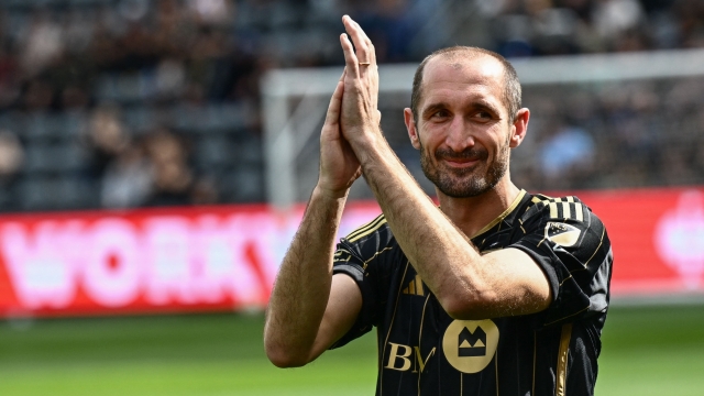 Former Los Angeles FC player Giorgio Chiellini is honored before the MLS football match between the Los Angeles FC and Seattle Sounders at BMO Stadium in Los Angeles, California on February 24, 2024. French World Cup winner Hugo Lloris made his debut for LAFC on Saturday as they beat the Seattle Sounders 2-1 in a re-match of last year's Western Conference semi-finals. (Photo by Patrick T. Fallon / AFP)