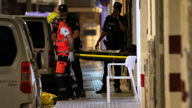 EDITORS NOTE: Graphic content / Emergency staff's members carry the body of a deceased after a two-storey restaurant collapsed, killing four and injuring at least 17 people on Playa de Palma, south of the Spanish Mediterranean island's capital Palma de Mallorca, on May 23, 2024. Four people died and 21 were injured after the roof of a two-storey restaurant collapsed on Spain's Mediterranean island of Mallorca on May 23, 2024, AFP reported. (Photo by JAIME REINA / AFP)