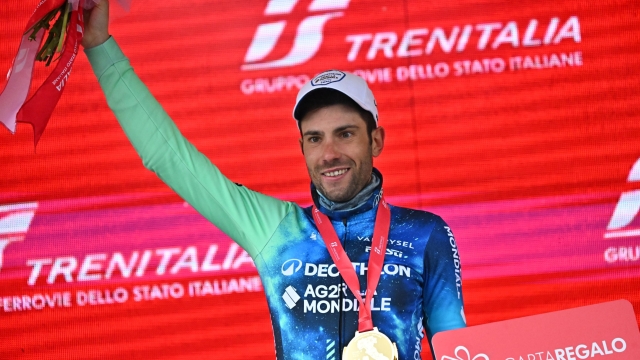 Italian rider Andrea Vendrame of Decathlon Ag2r La Mondiale Team celebrates on the podium after winning the 19th stage of the 107 Giro d'Italia 2024, cycling race over 157 km from Mortegliano to Sappada, Italy, 24 May 2024. ANSA/LUCA ZENNARO