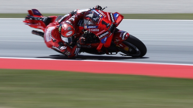 Italy's Francesco Bagnaia rides his Ducati during the MotoGP race of the Catalunya Motorcycle Grand Prix at the Catalunya racetrack in Montmelo, near Barcelona, Spain, Sunday, May 26, 2024. (AP Photo/Joan Monfort)