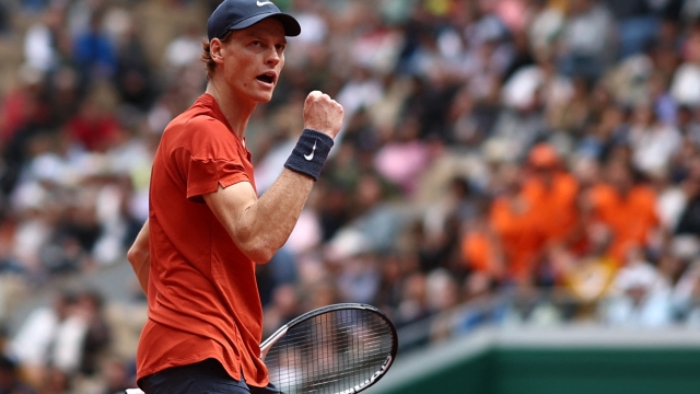 Italy's Jannik Sinner reacts after a point during his men's singles match against US Christopher Eubanks on Court Suzanne-Lenglen on day two of the French Open tennis tournament at the Roland Garros Complex in Paris on May 27, 2024. (Photo by Anne-Christine POUJOULAT / AFP)