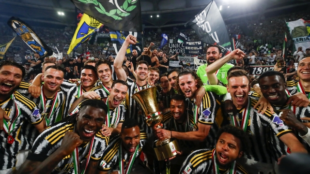 JuventusÕ players celebrate with the trophy during the winning ceremony after Coppa Italia final the Italian Cup (Coppa Italia) final soccer match between Atalanta BC and Juventus FC at the Olimpico stadium in Rome, Italy, 15 May 2024. ANSA/ANGELO CARCONI