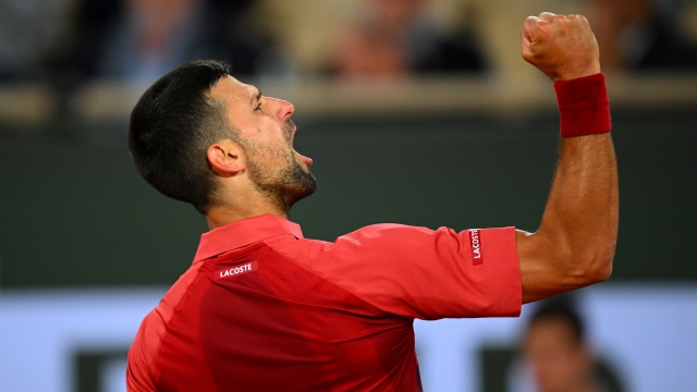 PARIS, FRANCE - MAY 28: Novak Djokovic of Serbia celebrates the third point in the second set tie break against Pierre-Hugues Herbert of France in the Men's Singles first round match on Day Three of the 2024 French Open at Roland Garros on May 28, 2024 in Paris, France. (Photo by Tim Goode/Getty Images)