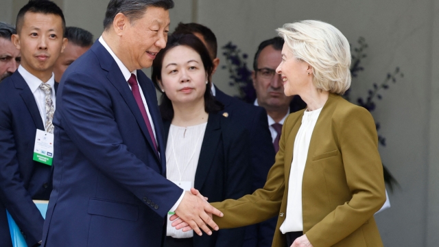 Chinese President Xi Jinping shakes hands with European Commission President Ursula von der Leyen as they leave after holding a trilateral meeting, which included the French President, as part of the Chinese president's two-day state visit, at the Elysee Palace in Paris, on May 6, 2024. French President Emmanuel Macron is to host Xi Jinping for a state visit on May 6, 2024, seeking to persuade the Chinese leader to shift positions over Russia's invasion of Ukraine and also imbalances in global trade. Xi's first visit to Europe since 2019 will also see him hold talks in Serbia and Hungary. Xi has said he wants to find peace in Ukraine even if analysts do not expect major changes in Chinese policy. (Photo by Ludovic MARIN / AFP)