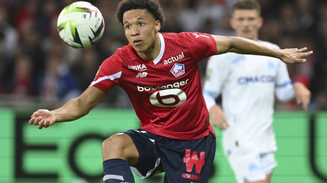 Lille's Tiago Santos in action during the French League One soccer match between Lille and Marseille at the Pierre Mauroy stadium in Villeneuve d'Ascq, northern France, Friday, April 5, 2024. (AP Photo/Matthieu Mirville)