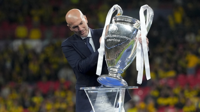 Zinedine Zidane handles the trophy after the Champions League final soccer match between Borussia Dortmund and Real Madrid at Wembley stadium in London, Saturday, June 1, 2024. (AP Photo/Kirsty Wigglesworth)