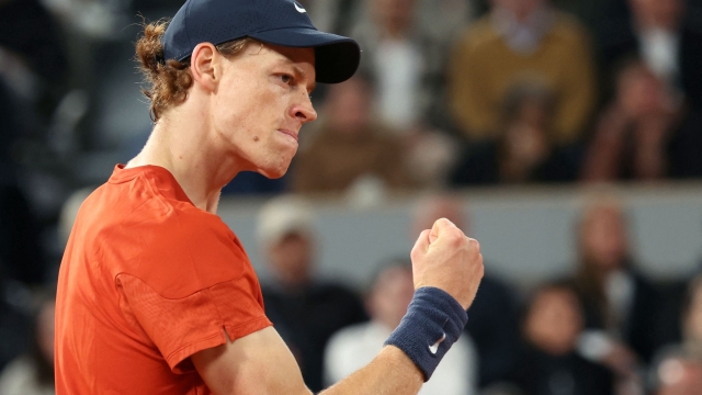 Italy's Jannik Sinner reacts after a point during his men's singles round of sixteen match against France's Corentin Moutet on Court Philippe-Chatrier on day eight of the French Open tennis tournament at the Roland Garros Complex in Paris on June 2, 2024. (Photo by ALAIN JOCARD / AFP)