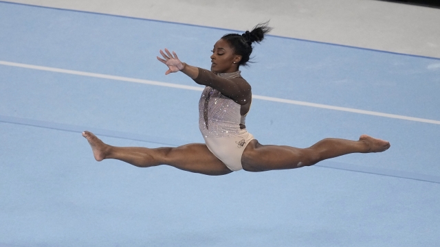 Simone Biles competes on the floor exercise during the U.S. Gymnastics Championships Sunday, June 2, 2024, in Fort Worth, Texas. (AP Photo/Tony Gutierrez)