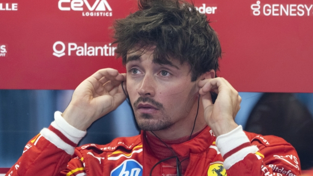 Ferrari driver Charles Leclerc, of Monaco, takes out his earplugs after the third practice session at the Formula 1 Canadian Grand Prix auto race Saturday, June 8, 2024 in Montreal.(Ryan Remiorz /The Canadian Press via AP)