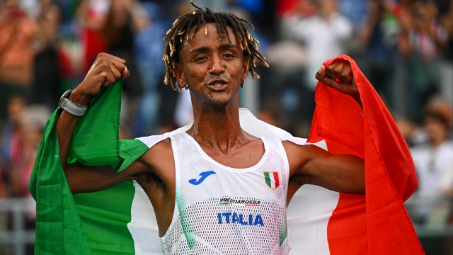 ROME, ITALY - JUNE 09: Gold medalist, Yemaneberhan Crippa of Team Italy, celebrates winning the Men's Half Marathon Final on day three of the 26th European Athletics Championships - Rome 2024 at Stadio Olimpico on June 09, 2024 in Rome, Italy. (Photo by Mattia Ozbot/Getty Images for European Athletics)