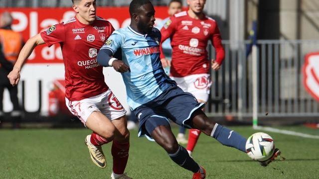 Le Havre's Senegalese defender #93 Arouna Sangante (R) fights for the ball with Brest's Uruguayan forward #07 Martin Satriano (L)     during the French L1 football match between Stade Brestois 29 (Brest) and Le Havre AC at Stade Francis-Le Ble in Brest, western France on March 3, 2024. (Photo by FRED TANNEAU / AFP)