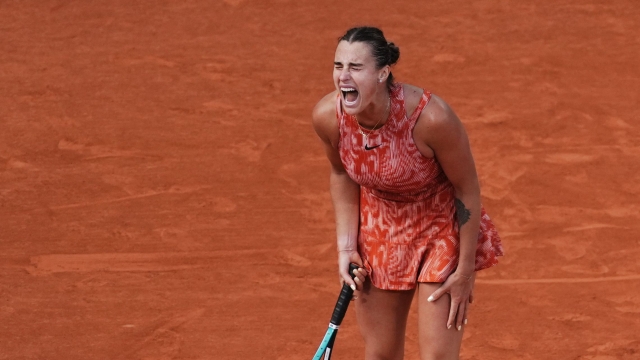 Belarus' Aryna Sabalenka reacts as she plays against Russia's Mirra Andreeva during their women's singles quarter final match on Court Philippe-Chatrier on day eleven of the French Open tennis tournament at the Roland Garros Complex in Paris on June 5, 2024. (Photo by Dimitar DILKOFF / AFP)