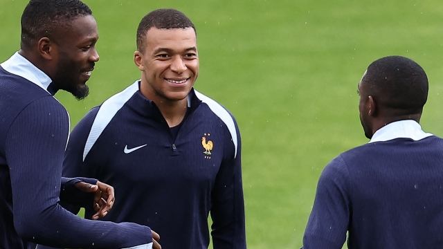 (From L) France's forward #15 Marcus Thuram, France's forward #10 Kylian Mbappe and France's forward #11 Ousmane Dembele take part in an MD-1 training session at Paul Janes Stadium in Duesseldorf on June 16, 2024, on the eve of their UEFA Euro 2024 Group D football match against Austria. (Photo by FRANCK FIFE / AFP)