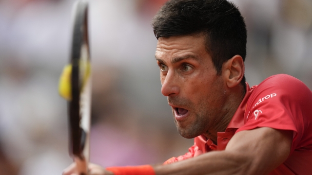 FILE - Serbia's Novak Djokovic plays a shot against Norway's Casper Ruud during the men's singles final match of the French Open tennis tournament at the Roland Garros stadium in Paris, Sunday, June 11, 2023. (AP Photo/Thibault Camus, File)