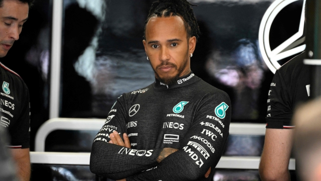 Mercedes' British driver Lewis Hamilton looks on in the stand during the first practice session at the Circuit de Catalunya on June 21, 2024 in Montmelo, on the outskirts of Barcelona, ahead of the Spanish Formula One Grand Prix. (Photo by Josep LAGO / AFP)