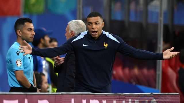 LEIPZIG, GERMANY - JUNE 21: Kylian Mbappe of France reacts from the substitute bench during the UEFA EURO 2024 group stage match between Netherlands and France at Football Stadium Leipzig on June 21, 2024 in Leipzig, Germany. (Photo by Clive Mason/Getty Images)