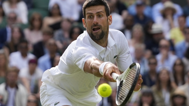 FILE - Serbia's Novak Djokovic returns to Spain's Carlos Alcaraz in the final of the men's singles on day fourteen of the Wimbledon tennis championships in London, Sunday, July 16, 2023. Djokovic is one of the men to watch at the U.S. Open, which begins at Flushing Meadows on Aug. 28.(AP Photo/Kirsty Wigglesworth, File)