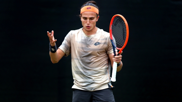 NOTTINGHAM, ENGLAND - JUNE 16: Mattia Bellucci of Italy reacts against Jacob Fearnley of Great Britain during the Men's Singles Semi Final match on Day Seven of the Rothesay Open Nottingham at Lexus Nottingham Tennis Centre on June 16, 2024 in Nottingham, England.  (Photo by Nathan Stirk/Getty Images for LTA)
