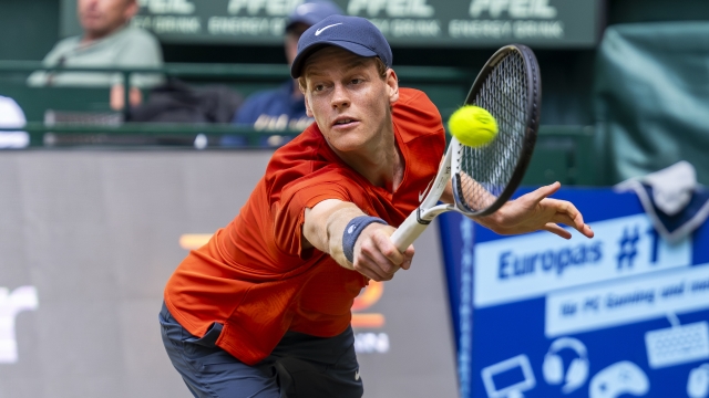 Italy's Jannik Sinner plays a shot during the semifinal match at ATP tennis tournament against Zhang Zhizhen of China, in Halle, Germany, June 22, 2024. (David Inderlied/dpa via AP)