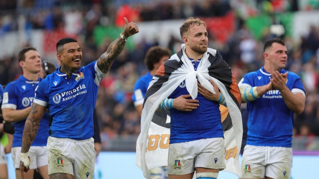 Niccolo' Cannone and Monty Ioane of Italy celebrate the victory with their teammates at the end of the Six Nations rugby match between Italy and Scotland at Olimpico stadium in Rome, Italy, 09 March 2024. ANSA/FEDERICO PROIETTI