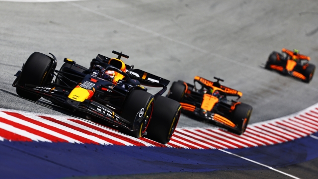 SPIELBERG, AUSTRIA - JUNE 29: Max Verstappen of the Netherlands driving the (1) Oracle Red Bull Racing RB20 leads Oscar Piastri of Australia driving the (81) McLaren MCL38 Mercedes during the Sprint ahead of the F1 Grand Prix of Austria at Red Bull Ring on June 29, 2024 in Spielberg, Austria. (Photo by Mark Thompson/Getty Images)