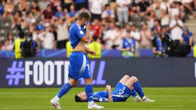 Italy's Alessandro Bastoni and Italy's Davide Frattesi Team Italy dejected during the Euro 2024 soccer match between Swiss and Italy at the Olympiastadion, Berlin, Germany - Saturday 29, June, 2024. Sport - Soccer . (Photo by Fabio Ferrari/LaPresse)