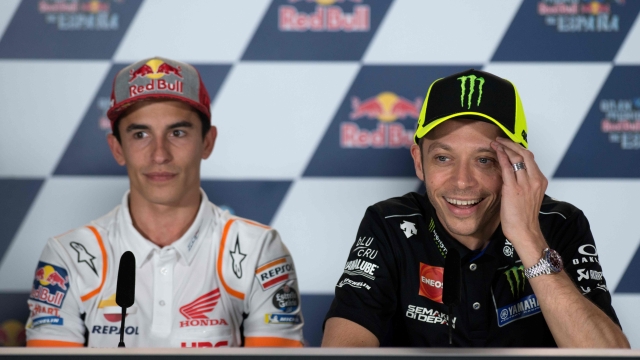 Monster Energy Yamaha's Italian rider Valentino Rossi and Repsol Honda Team's Spanish rider Marc Marquez (L) attend a press conference at the Jerez-Angel Nieto Circuit in Jerez de la Frontera on May 2, 2019 ahead of the Spanish Grand Prix. (Photo by JORGE GUERRERO / AFP)