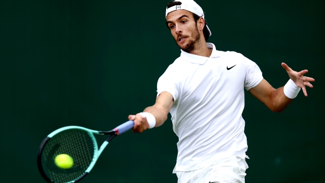 LONDON, ENGLAND - JULY 02: Lorenzo Musetti of Italy plays a forehand against Constant Lestienne of France in his Gentlemen's Singles first round match during day two of The Championships Wimbledon 2024 at All England Lawn Tennis and Croquet Club on July 02, 2024 in London, England. (Photo by Francois Nel/Getty Images)