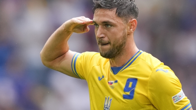 Ukraine's Roman Yaremchuk celebrates after scoring his side's second goal during a Group E match between Slovakia and Ukraine at the Euro 2024 soccer tournament in Duesseldorf, Germany, Friday, June 21, 2024. (AP Photo/Andreea Alexandru)