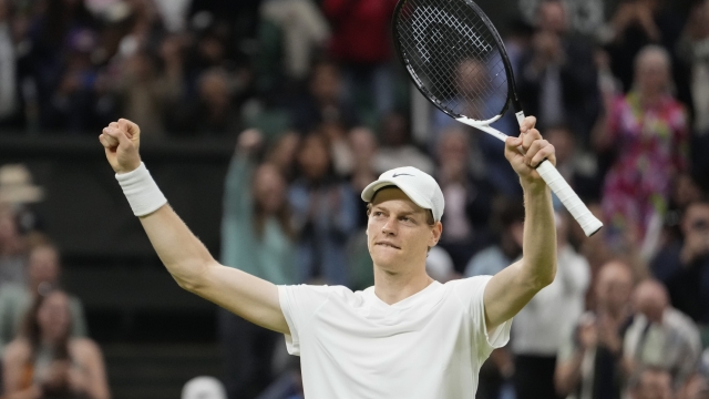Jannik Sinner of Italy celebrates after defeating compatriot Matteo Berrettini in their second round match at the Wimbledon tennis championships in London, Wednesday, July 3, 2024. (AP Photo/Alberto Pezzali)