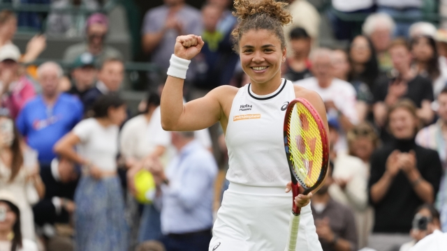 Jasmine Paolini of Italy reacts after defeating Bianca Andreescu of Canada in their third round match at the Wimbledon tennis championships in London, Friday, July 5, 2024. (AP Photo/Kirsty Wigglesworth)