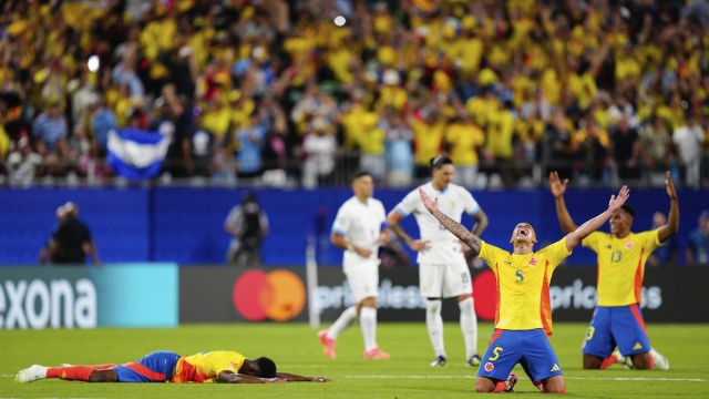 Colombia's Kevin Castano (5) celebrates defeating Uruguay in a Copa America semifinal soccer match in Charlotte, N.C., Wednesday, July 10, 2024. (AP Photo/Jacob Kupferman)
