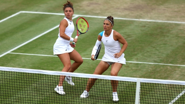 LONDON, ENGLAND - JULY 08: Jasmine Paolini of Italy looks on with Sara Errani of Italy as they play against Jessica Pegula of United States and Coco Gauff of United States in the Ladies' Doubles third round match during day eight of The Championships Wimbledon 2024 at All England Lawn Tennis and Croquet Club on July 08, 2024 in London, England. (Photo by Francois Nel/Getty Images)
