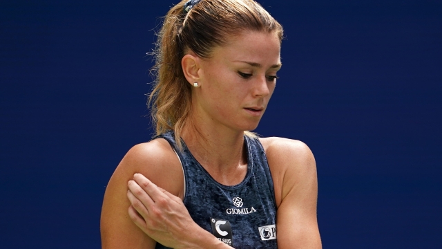 epa10827485 Camila Giorgi of Italy during her first round match against Jessica Pegula of the United States during at the US Open Tennis Championships at the USTA National Tennis Center in Flushing Meadows, New York, USA, 29 August 2023. The US Open runs from 28 August through 10 September.  EPA/WILL OLIVER