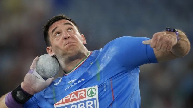 Leonardo Fabbri, of Italy, makes an attempt in the men's shot put final at the the European Athletics Championships in Rome, Saturday, June 8, 2024. (AP Photo/Andrew Medichini)