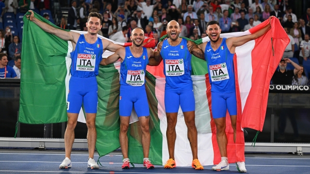 ROME, ITALY - JUNE 12:  Gold medalists Filippo Tortu, Lorenzo Patta, Lamont Marcell Jacobs and Matteo Melluzzo of Team Italy celebrate winning the gold medal in the Men?s 4x100m Relay Final on day six of the 26th European Athletics Championships - Rome 2024 at Stadio Olimpico on June 12, 2024 in Rome, Italy.  (Photo by Mattia Ozbot/Getty Images for European Athletics)