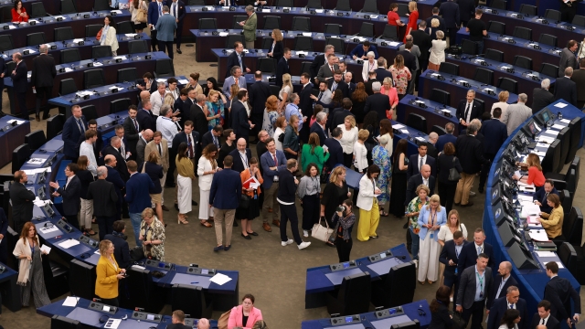 STRASBOURG, FRANCE - JULY 18: Deputies of the European Parliament queue to cast their ballot on July 18, 2024 in Strasbourg, France. Members of the European Parliament decide today on a second term for Ursula von der Leyen as the head of the European Commission, a role she has held since December 1, 2019. To be re-elected, she needs the support of at least 361 MEPs in the 720-seat European Parliament. Additionally, the leadership positions for the European Parliament, European Council, and the EU's foreign affairs are also being decided. On Tuesday, the newly-elected EU Parliament began its first legislative term in France following the recent elections. (Photo by Johannes Simon/Getty Images)