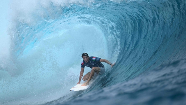 Italian surfer Leonardo Fioravanti competes in the Shiseido Tahiti Pro surfing competition in Teahupo'o, on the French Polynesian Island of Tahiti, on May 29, 2024. Teahupo'o will host the surfing event of the Paris 2024 Olympic Games. (Photo by JEROME BROUILLET / AFP)