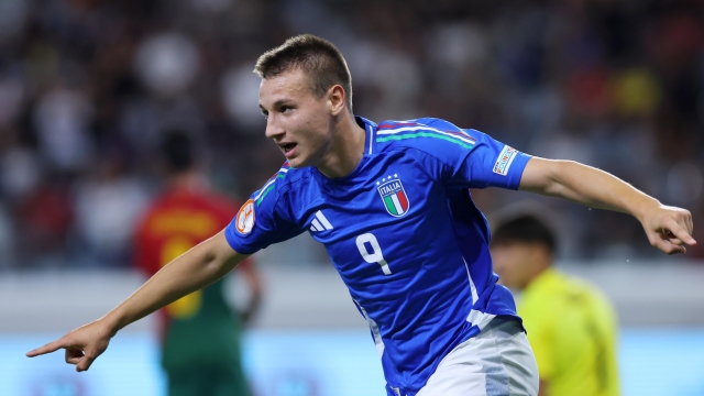 epa11392002 Francesco Camarda of Italy celebrates after scoring his team's third goal during the UEFA Under-17 final between Italy and Portugal in Limassol, Cyprus, 05 June 2024.  EPA/SAKIS SAVVIDES