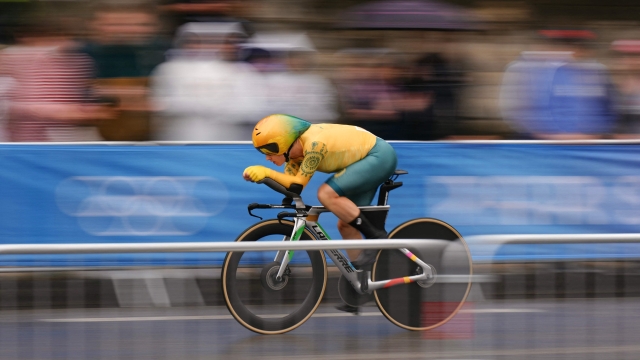 Australia's Grace Brown cycles as she competes in the women's road cycling individual time trial during the Paris 2024 Olympic Games in Paris, on July 27, 2024. (Photo by Dimitar DILKOFF / AFP)