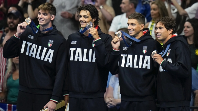 The Italian men\'s 4x100-meter freestyle relay team celebrate as they stand on the podium after winning the bronze medal at the 2024 Summer Olympics, Saturday, July 27, 2024, in Nanterre, France. (AP Photo/Petr David Josek)     Associated Press / LaPresse Only italy and Spain