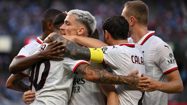 NEW YORK, NEW YORK - JULY 27: Marco Nasti of AC Milan celebrates with teammate Alexis Saelemaekers after scoring the team's third goal during a Pre-Season Friendly match between Manchester City and AC Milan at Yankee Stadium on July 27, 2024 in New York City.   Drew Hallowell/Getty Images/AFP (Photo by Drew Hallowell / GETTY IMAGES NORTH AMERICA / Getty Images via AFP)