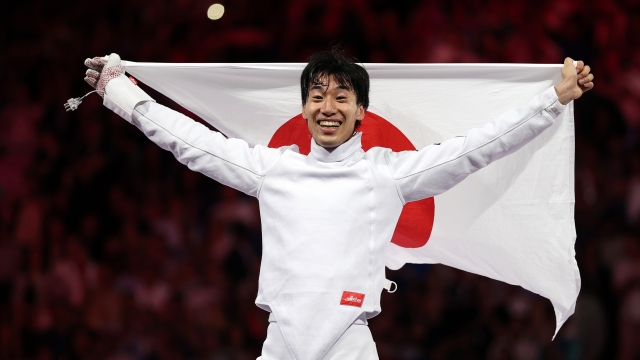 PARIS, FRANCE - JULY 28:  Koki Kano of Team Japan celebrates winning the Men's Épée Individual Gold Medal Bout between Koki Kano of Team Japan and Yannick Borel of Team France on day two of the Olympic Games Paris 2024 at Grand Palais on July 28, 2024 in Paris, France. (Photo by Patrick Smith/Getty Images)