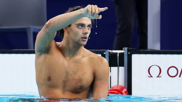 NANTERRE, FRANCE - JULY 29: Thomas Ceccon of Team Italy celebrates after winning gold in the Men?s 100m Backstroke Final on day three of the Olympic Games Paris 2024 at Paris La Defense Arena on July 29, 2024 in Nanterre, France. (Photo by Sarah Stier/Getty Images)