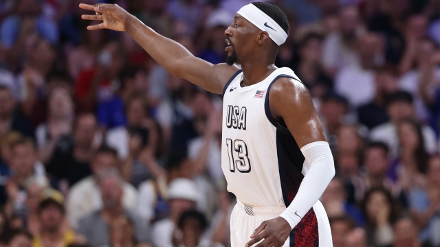 LILLE, FRANCE - JULY 31: Bam Adebayo #13 of Team United States reacts after a three point basket during a Men's Group Phase - Group C game between the United States and South Sudan on day five of the Olympic Games Paris 2024 at Stade Pierre Mauroy on July 31, 2024 in Lille, France. (Photo by Gregory Shamus/Getty Images)