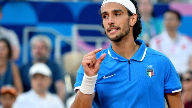 Lorenzo Musetti of Italy reacts during his Men's Singles semifinal match of the Tennis competitions against Novak Djokovic of Serbia in the Paris 2024 Olympic Games at the Roland Garros, Paris, France, 02 August 2024.  ANSA/ETTORE FERRARI